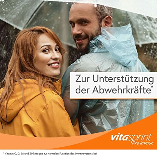 Paar unter Regenschirm mit Vitamine-Werbung